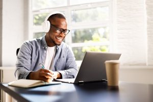 Young,African,American,Man,Excels,In,Online,Education,,Studying,With